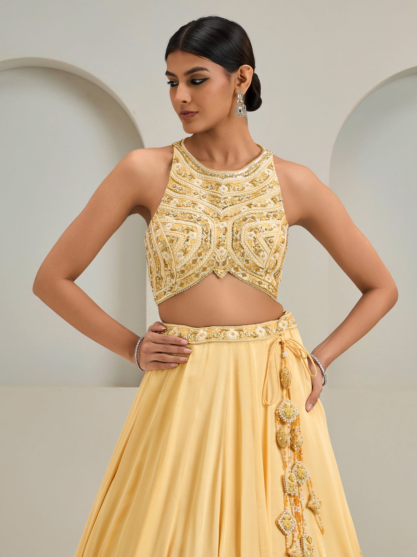 Cream Yellow Embroidered Halter Neck Blouse With Lehanga And Dupatta