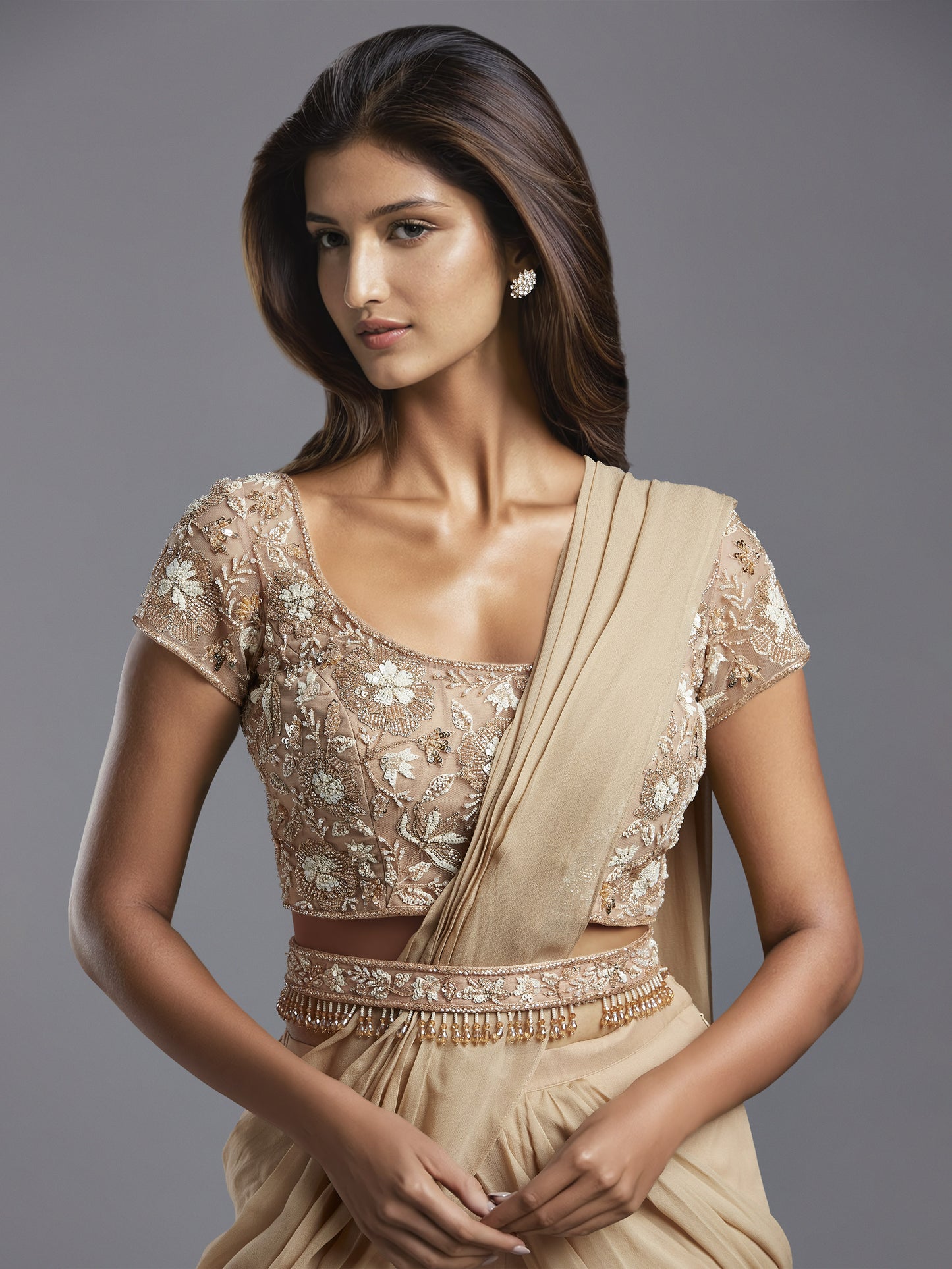 Nude Net White and Rose Gold Floral Work Blouse with Nude Georgette Draped Saree and Belt