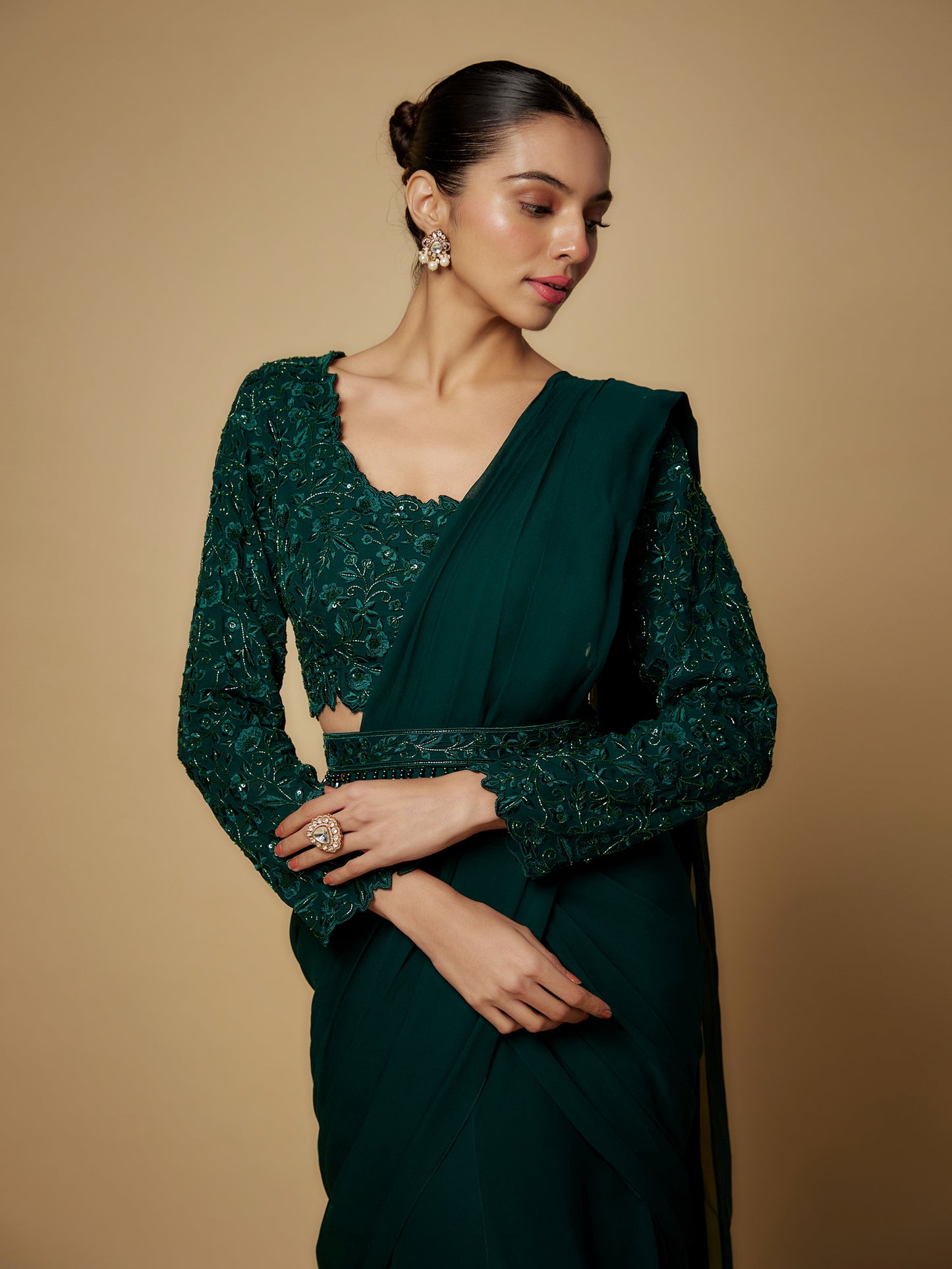 Bottle Green Georgette Draped Saree with Embroidered Blouse and Belt