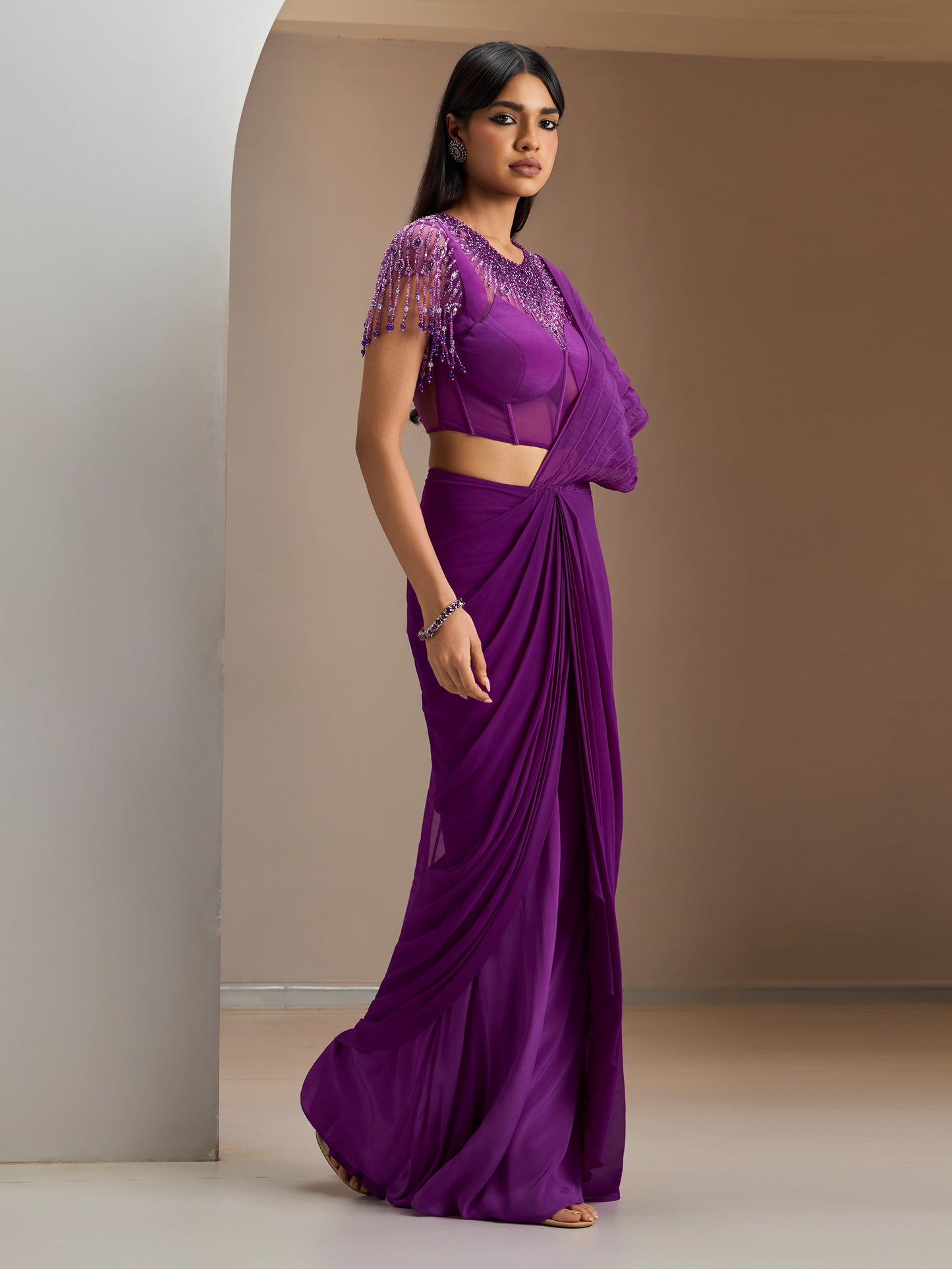 Purple Jeweled Net Blouse With Concept Draped Saree