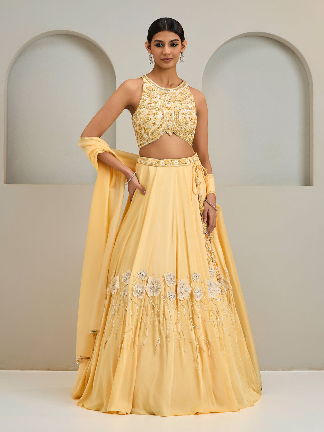 Cream Yellow Embroidered Halter Neck Blouse With Lehanga And Dupatta