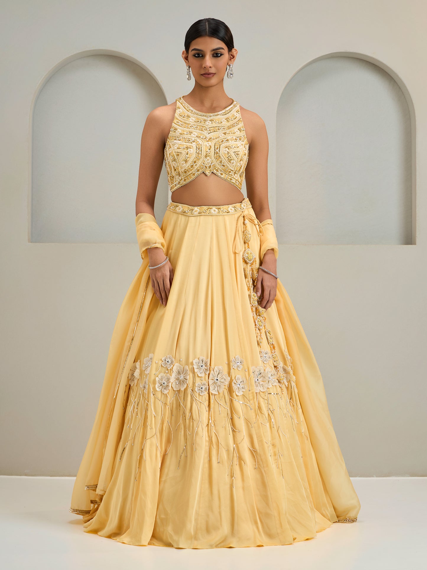 Cream Yellow Embroidered Halter Neck Blouse With Lehanga And Dupatta