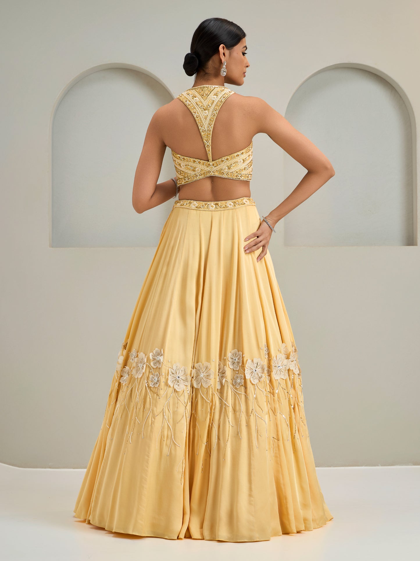 Cream Yellow Embroidered Halter Neck Blouse With Lehanga And Dupatta