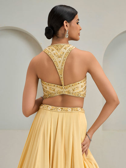 Cream Yellow Embroidered Halter Neck Blouse With Lehanga And Dupatta