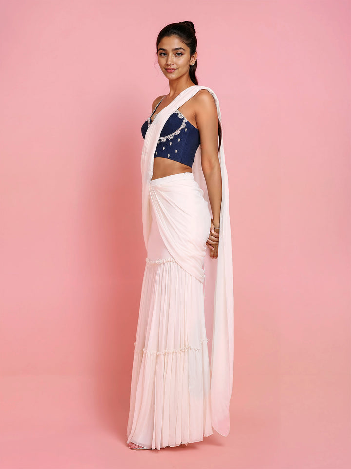 Hand Embroidered Denim Corset with Ivory Georgette Drape Saree