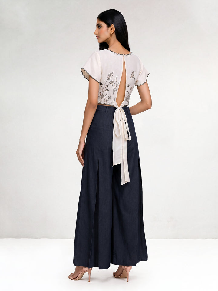 Beige Floral Embroidered Crop Top with Tie-Up Back with Black Flaired Inverted Pleat Denim Pants