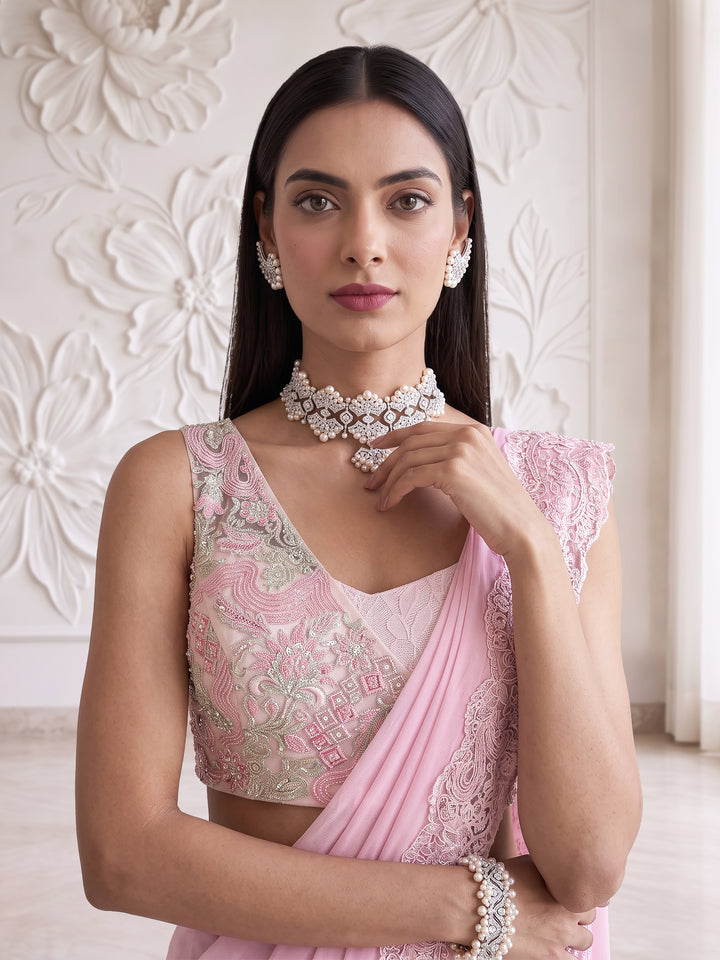 LIGHT PINK ONE SHOULDER BLOUSE WITH LACE INSERTED DRAPE SAREE SET